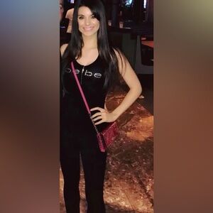 Bebe Elegant Black Sleeveless Cat Suit